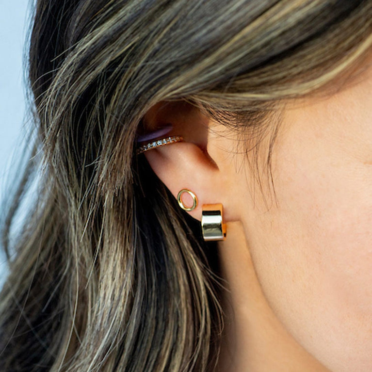 Kris Nations Twisted Hinged Huggie Hoop Earrings in Gold main image 1
